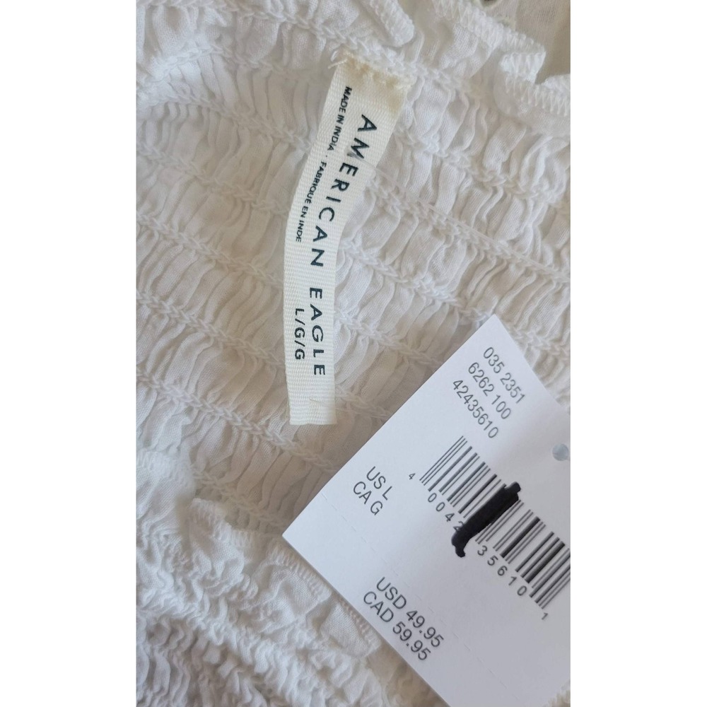 White Smocked Peplum Long-Sleeve Top - Picture 3 of 8